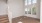 Living Room with hardwood like floors and stairs